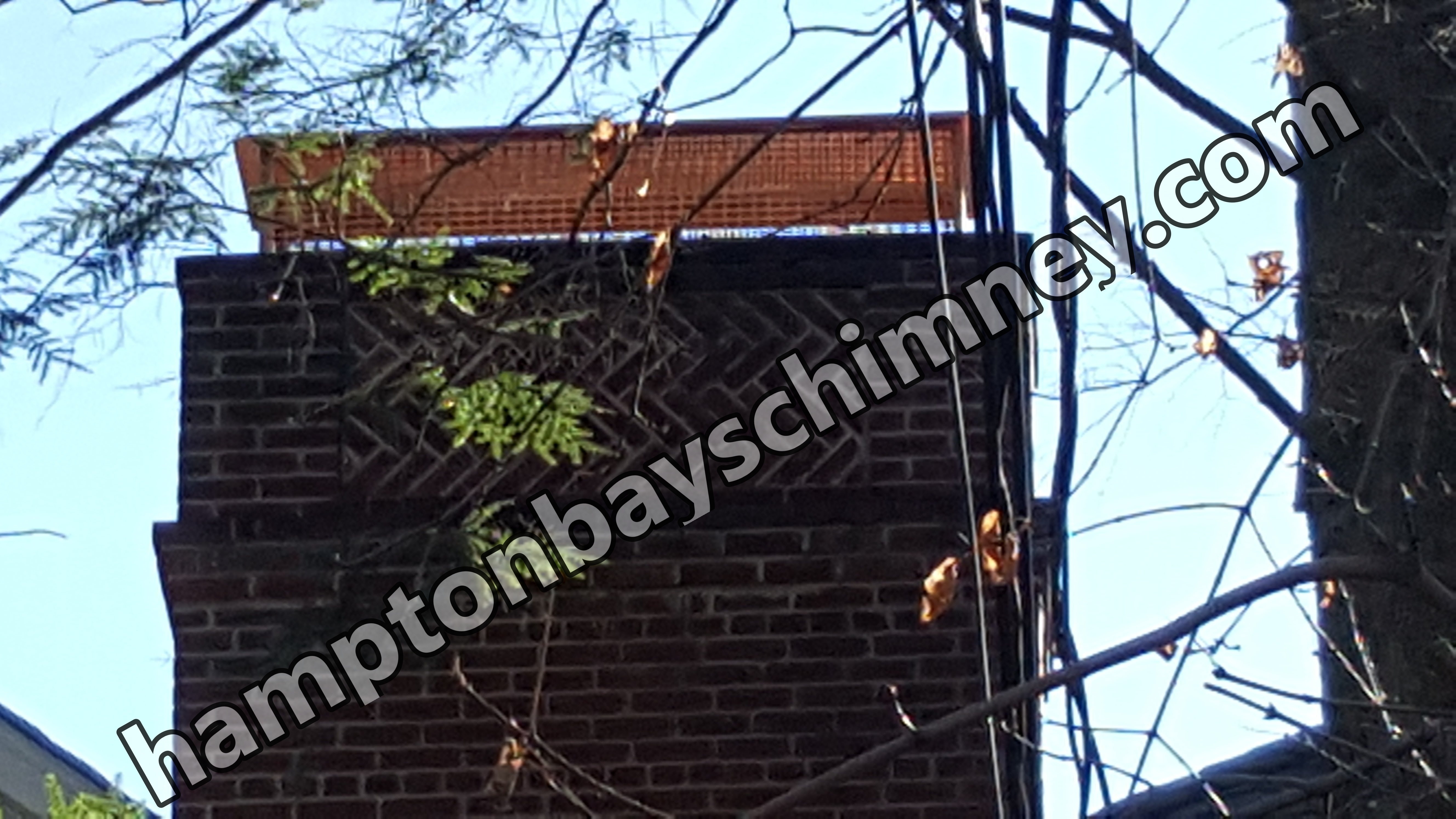 Animal-proof chimney cap protecting home in Hampton Bays, New York