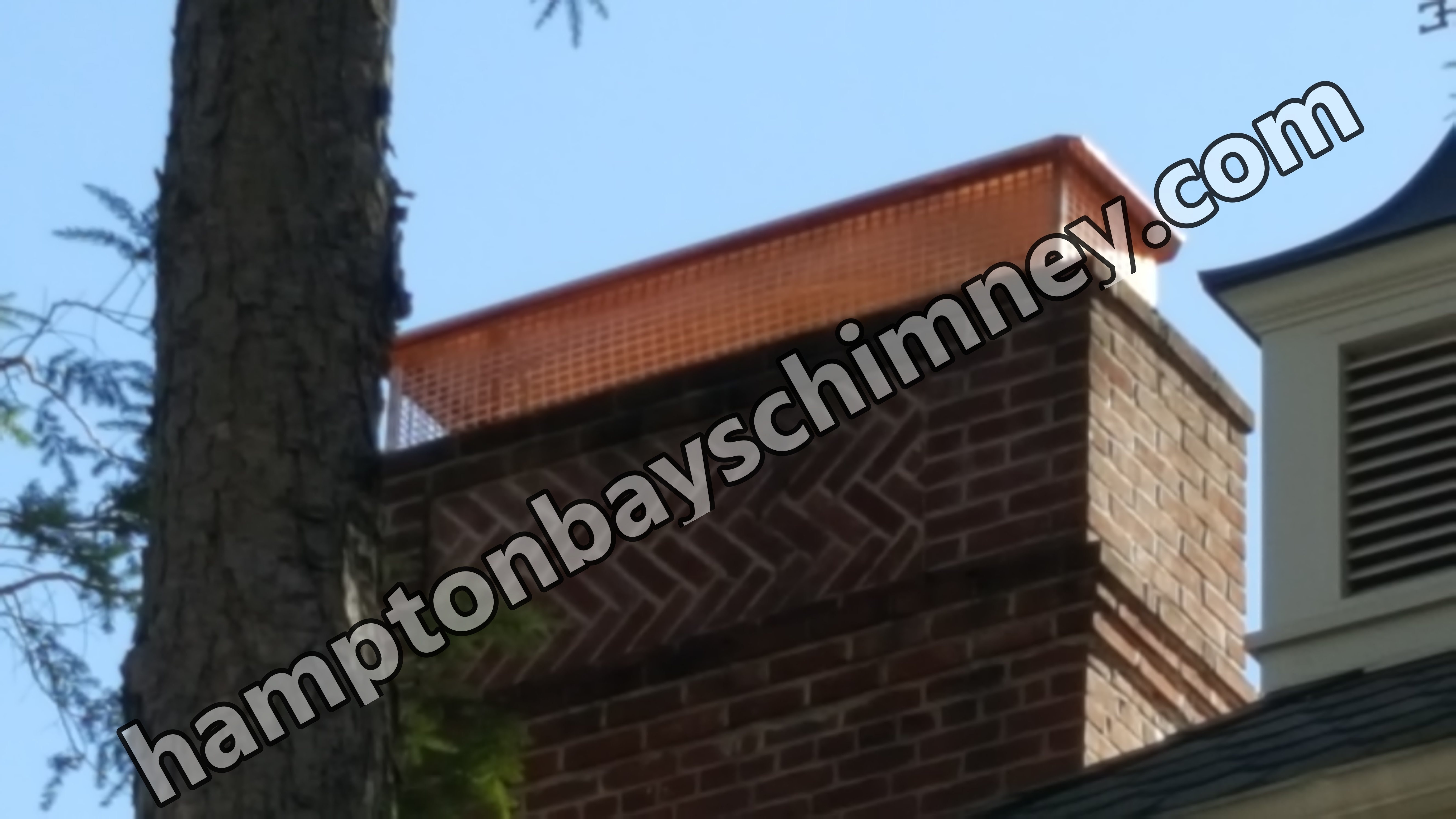 New stainless steel chimney cap installed in Hampton Bays, NY