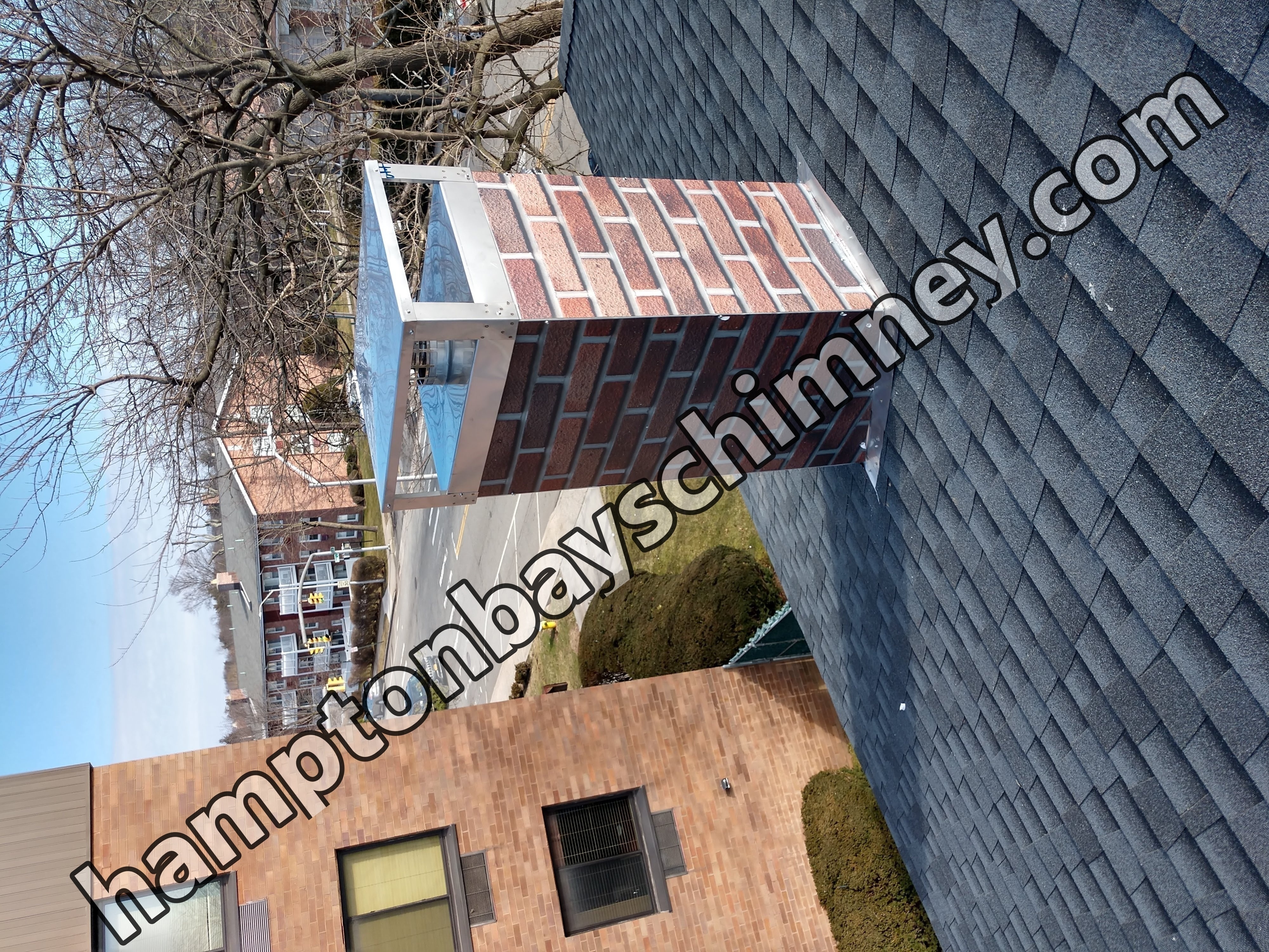 New elastomeric sealant applied to chimney crown in Hampton Bays, NY